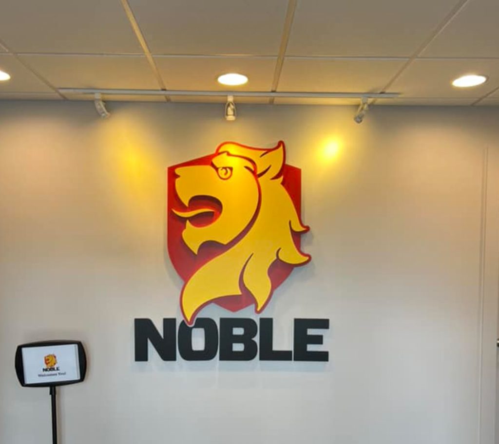 Noble signage on office wall