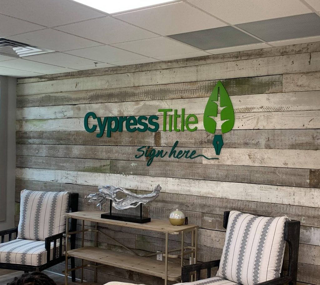 Cypress Title Signage inside of office